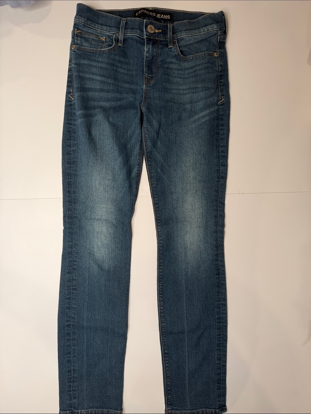 Express Skinny Jeans in Mid Blue Wash